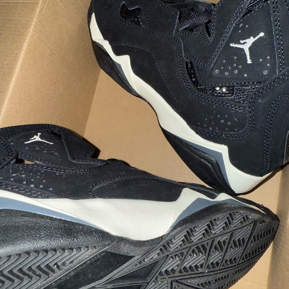 Jordan big kids Black and White Sneakers